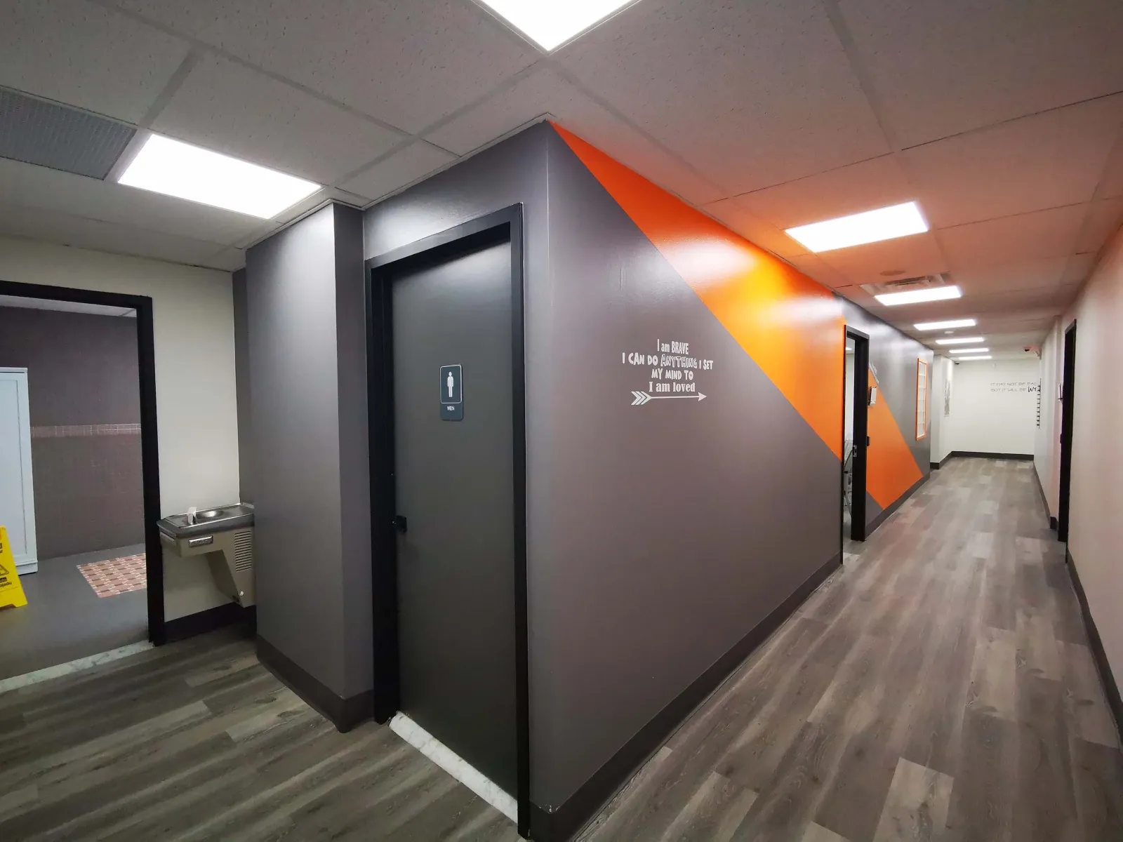 4105 Avenue V Office — Restroom corridor & water fountain — after