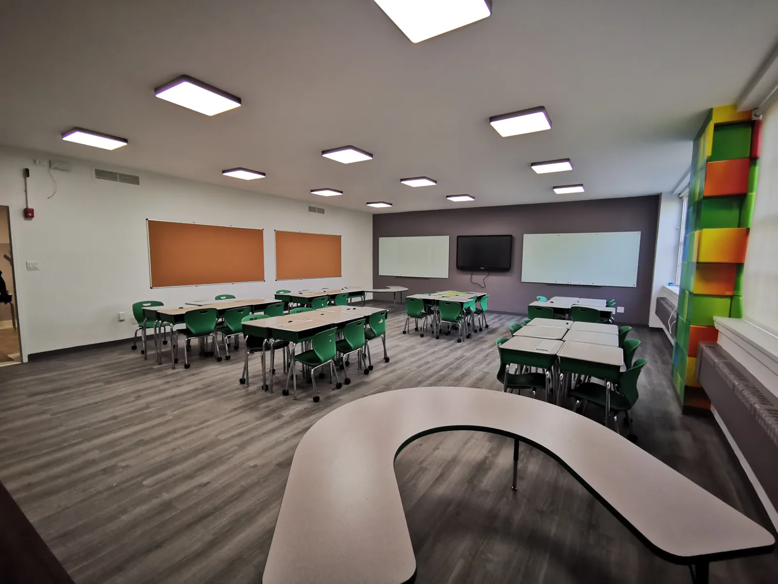475 East 57th Street — Classroom transformed from dated drop-ceiling space to a bright, modern learning environment — after