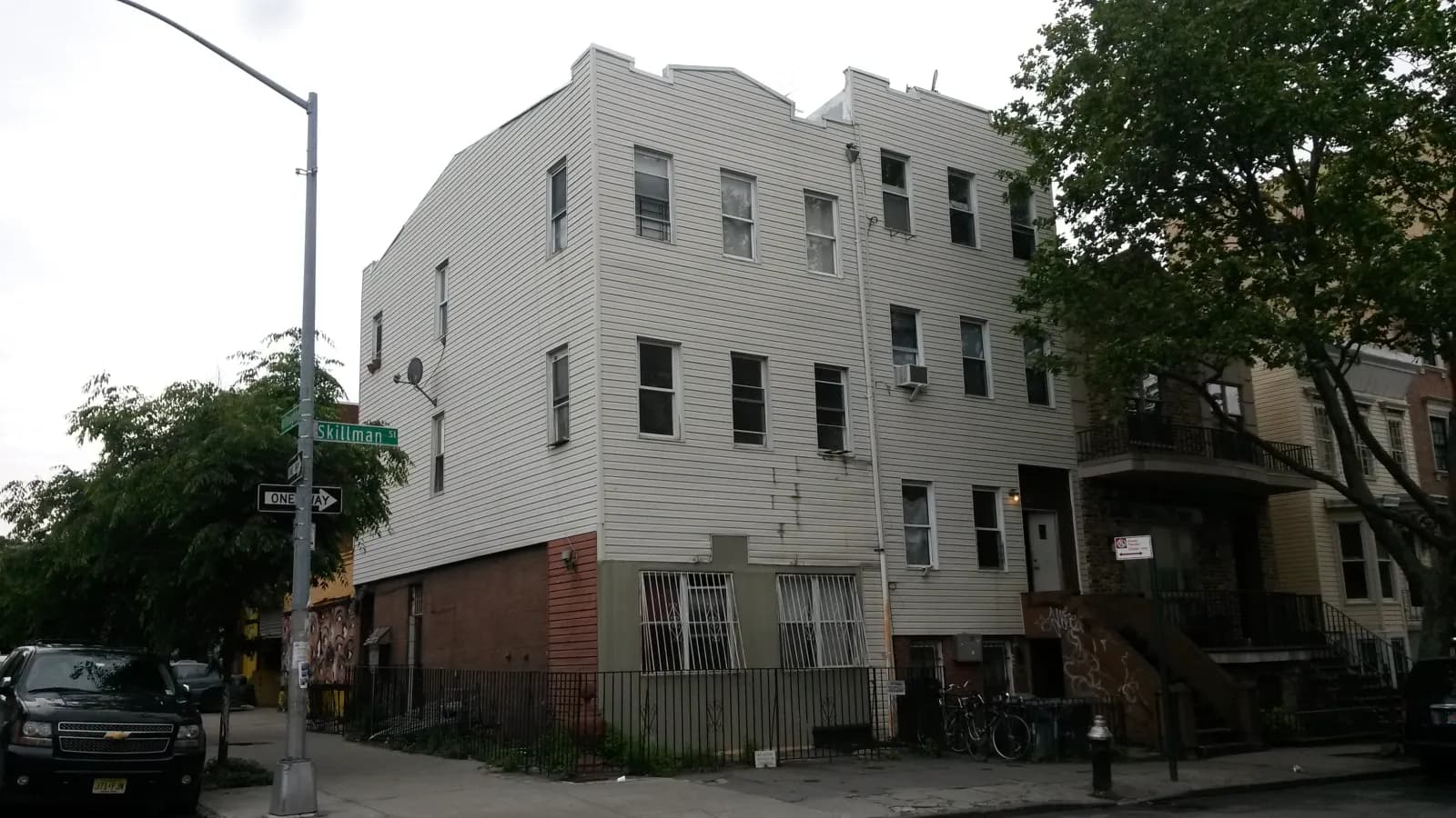 Corner facade re-clad — 178–180 Skillman St, Brooklyn — before