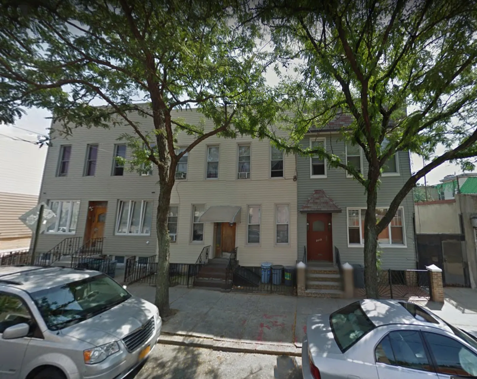2014 Bleecker Street — The original clapboard rowhouse facade rebuilt as a modern masonry front. — before